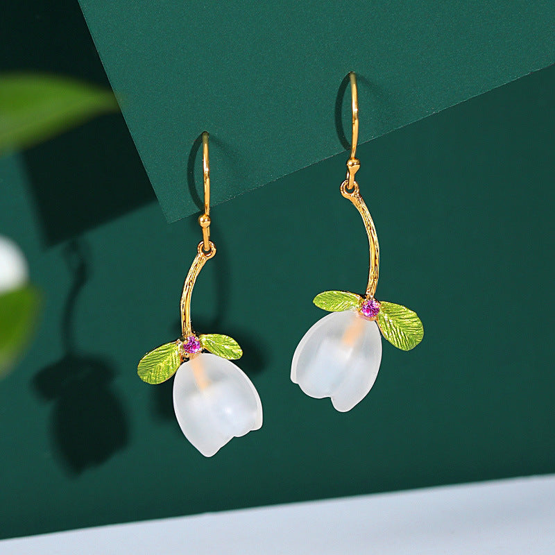Hermosos aretes colgantes de flores de cristal natural
