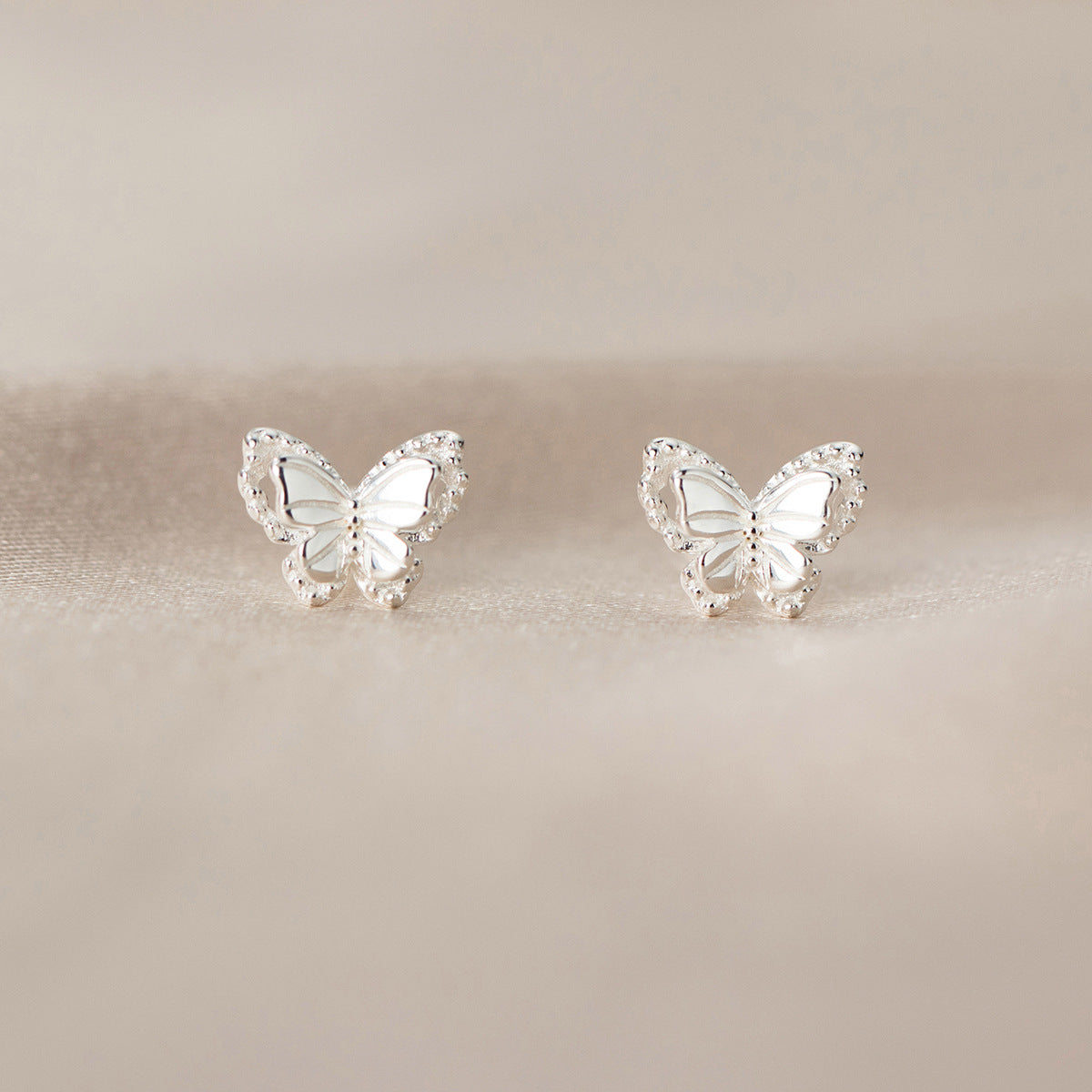 Luxyin Flutter Sparkle: 925 Silver Butterfly Stud Earrings