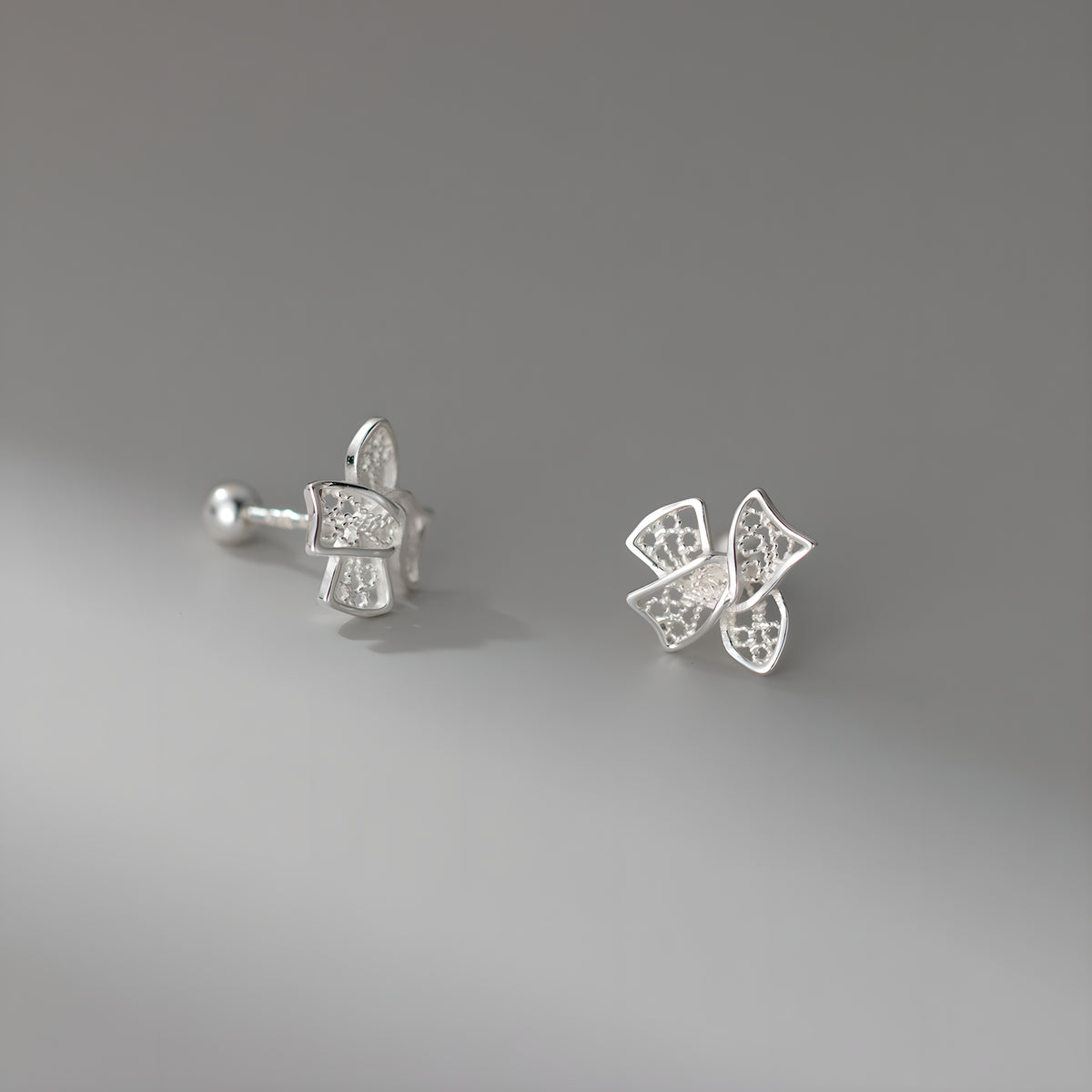 999 Pure Silver Hollow Filigree Bow Cartilage Stud Earrings