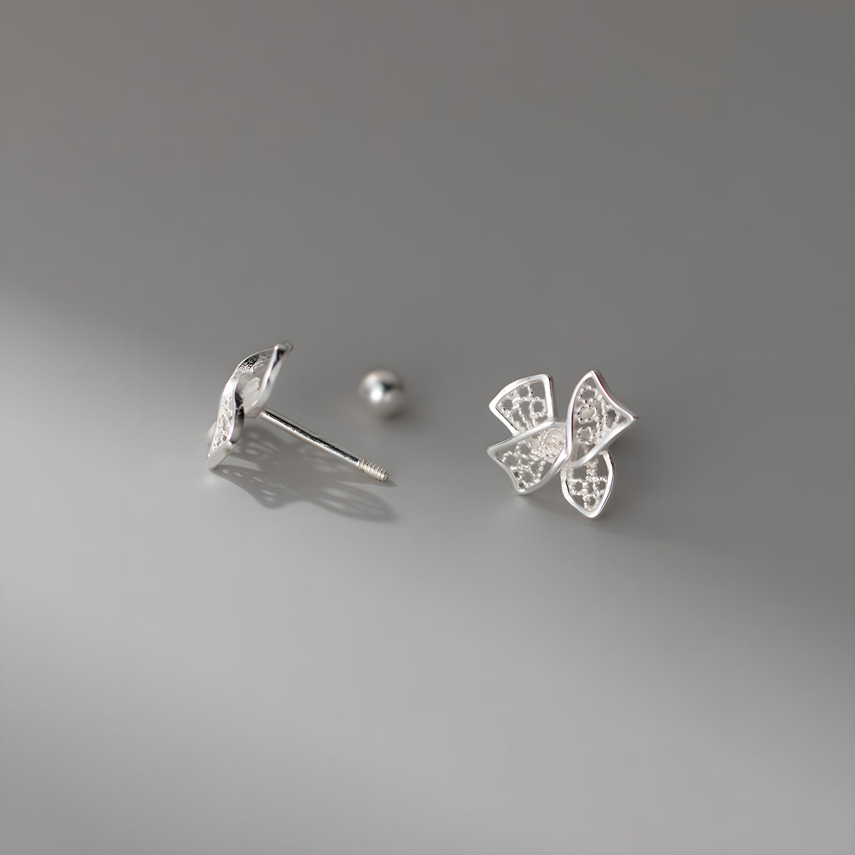 999 Pure Silver Hollow Filigree Bow Cartilage Stud Earrings