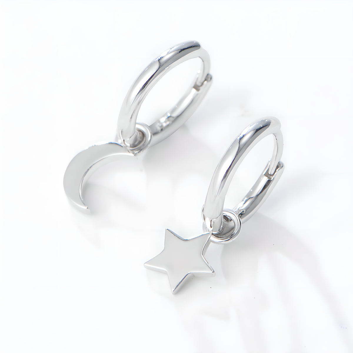 Asymmetrical Star & Moon Dangle Earrings in S925 Sterling Silver