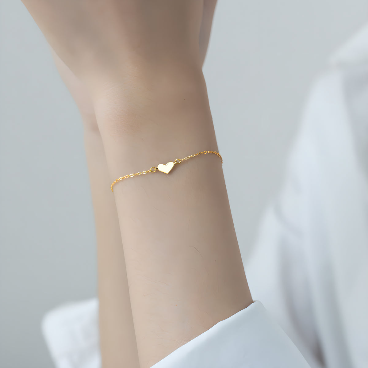 Dainty Heart Charm Bracelet in Sterling Silver