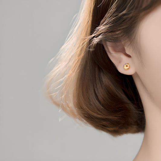 Hollow Yarn Knot Stud Earrings in S925 Sterling Silver