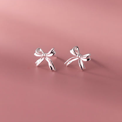 Silver Bow Stud Earrings - Delicate & Elegant Design