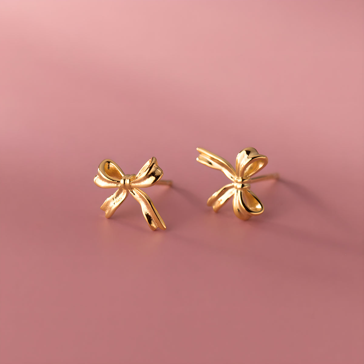 Silver Bow Stud Earrings - Delicate & Elegant Design