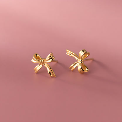 Silver Bow Stud Earrings - Delicate & Elegant Design