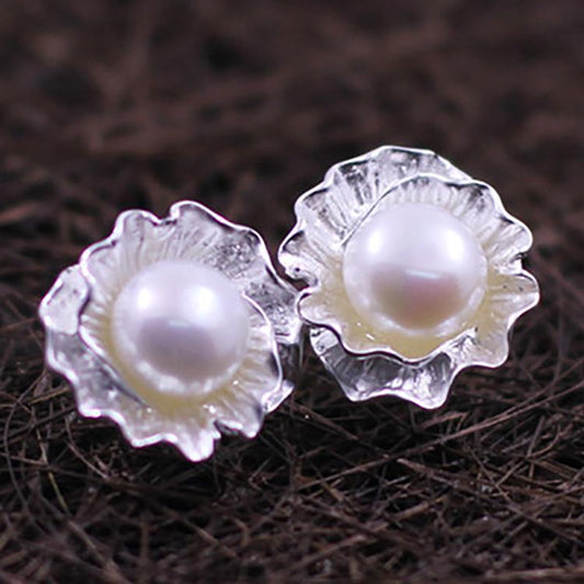 Aretes de botón de perla